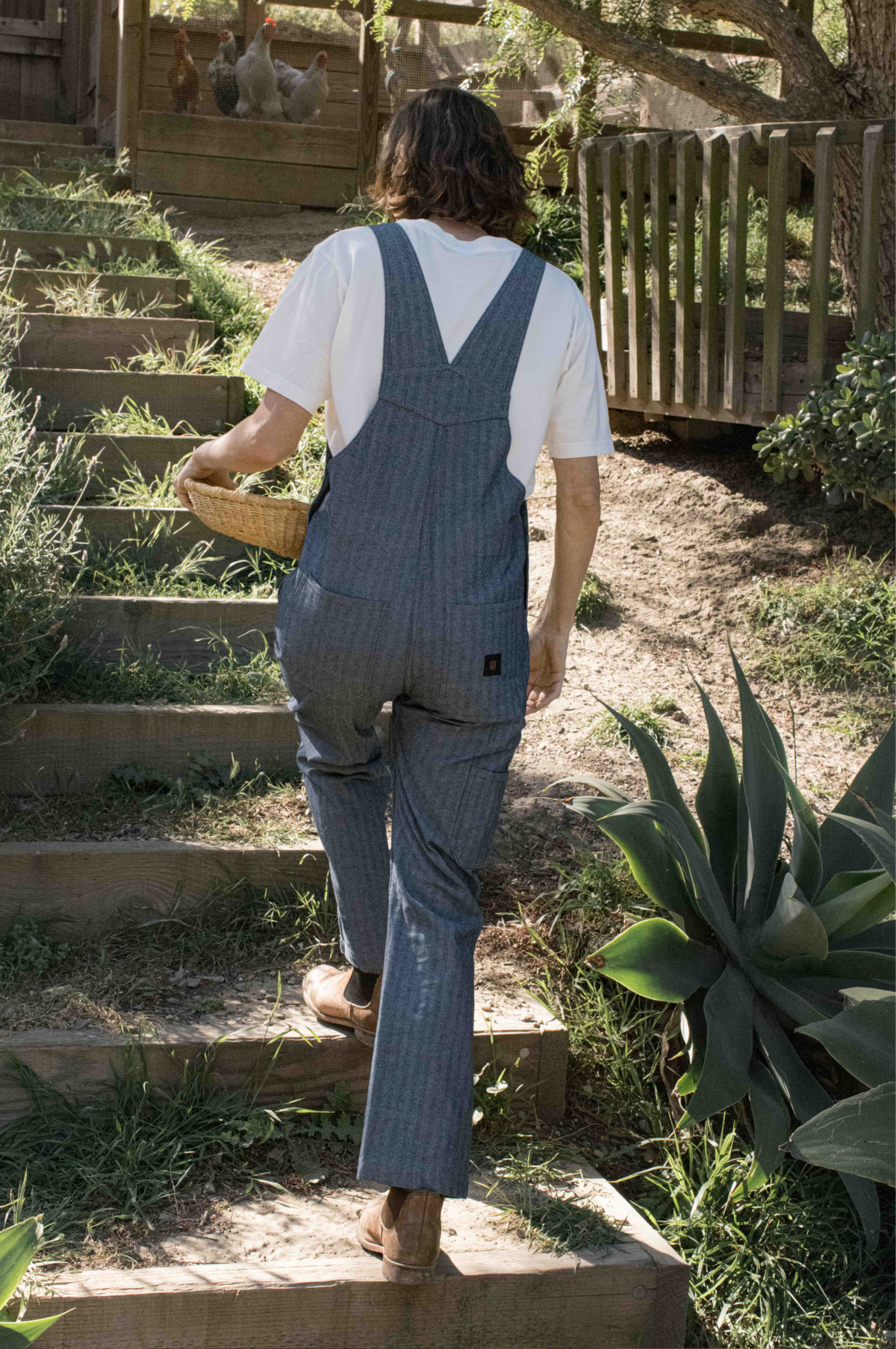 Women wearing utility overalls 
