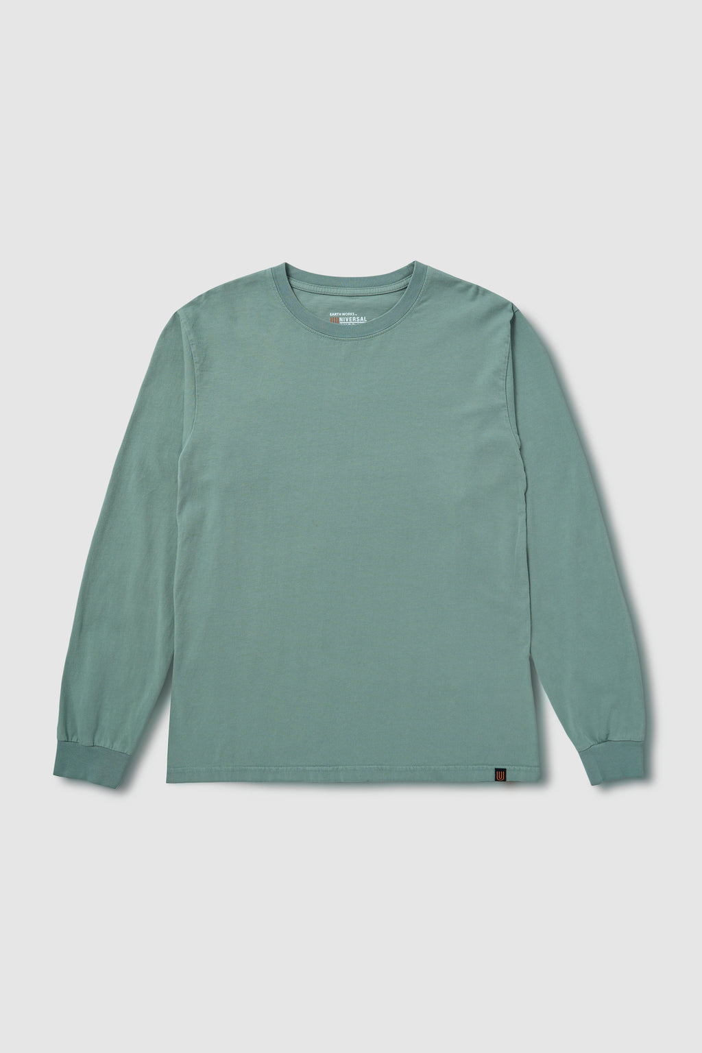 Green long-sleeve shirt on a light gray background
