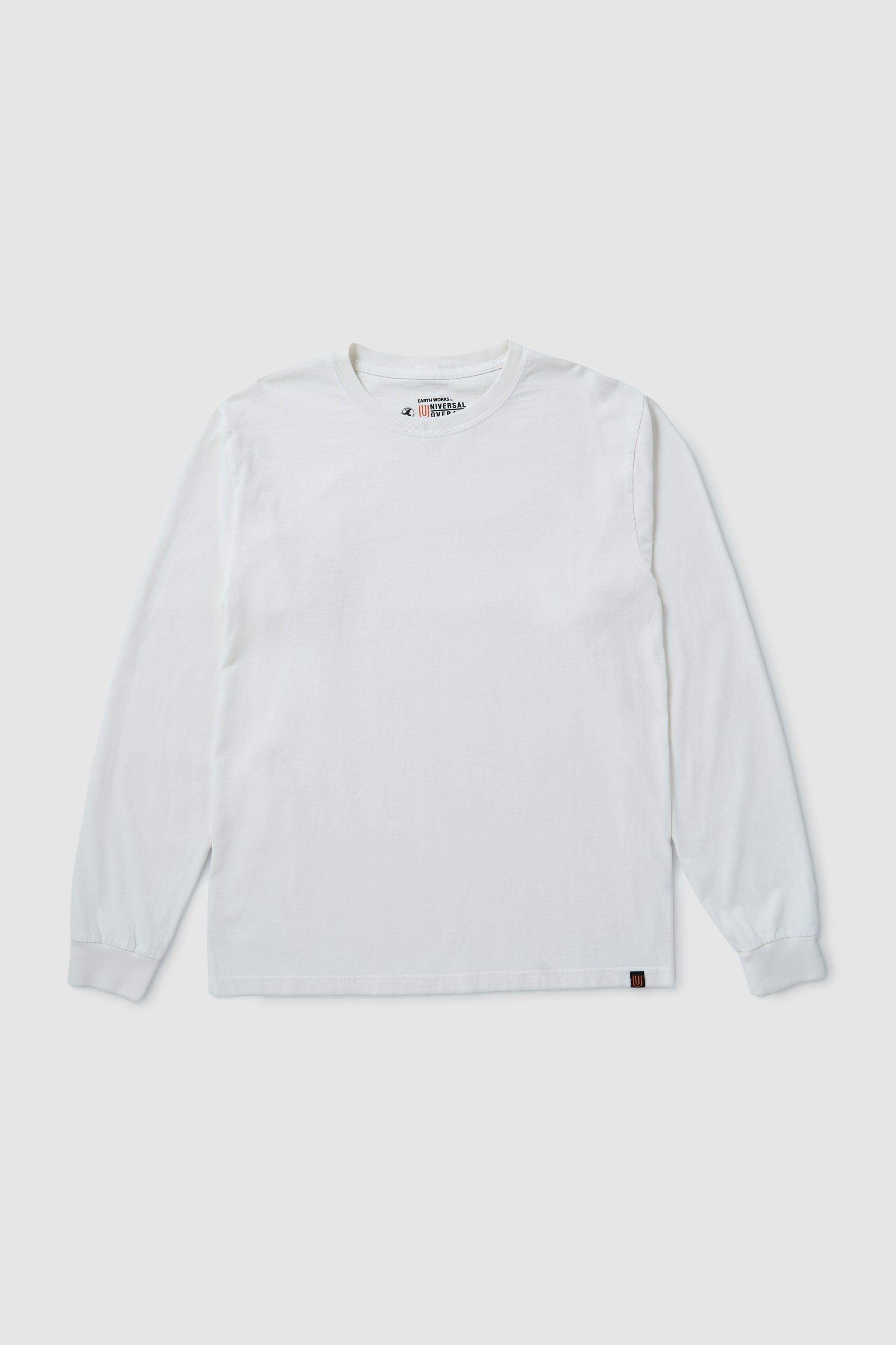 White long-sleeve shirt on a light gray background