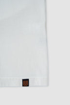 White hoodie with a small logo on the chest against a white background