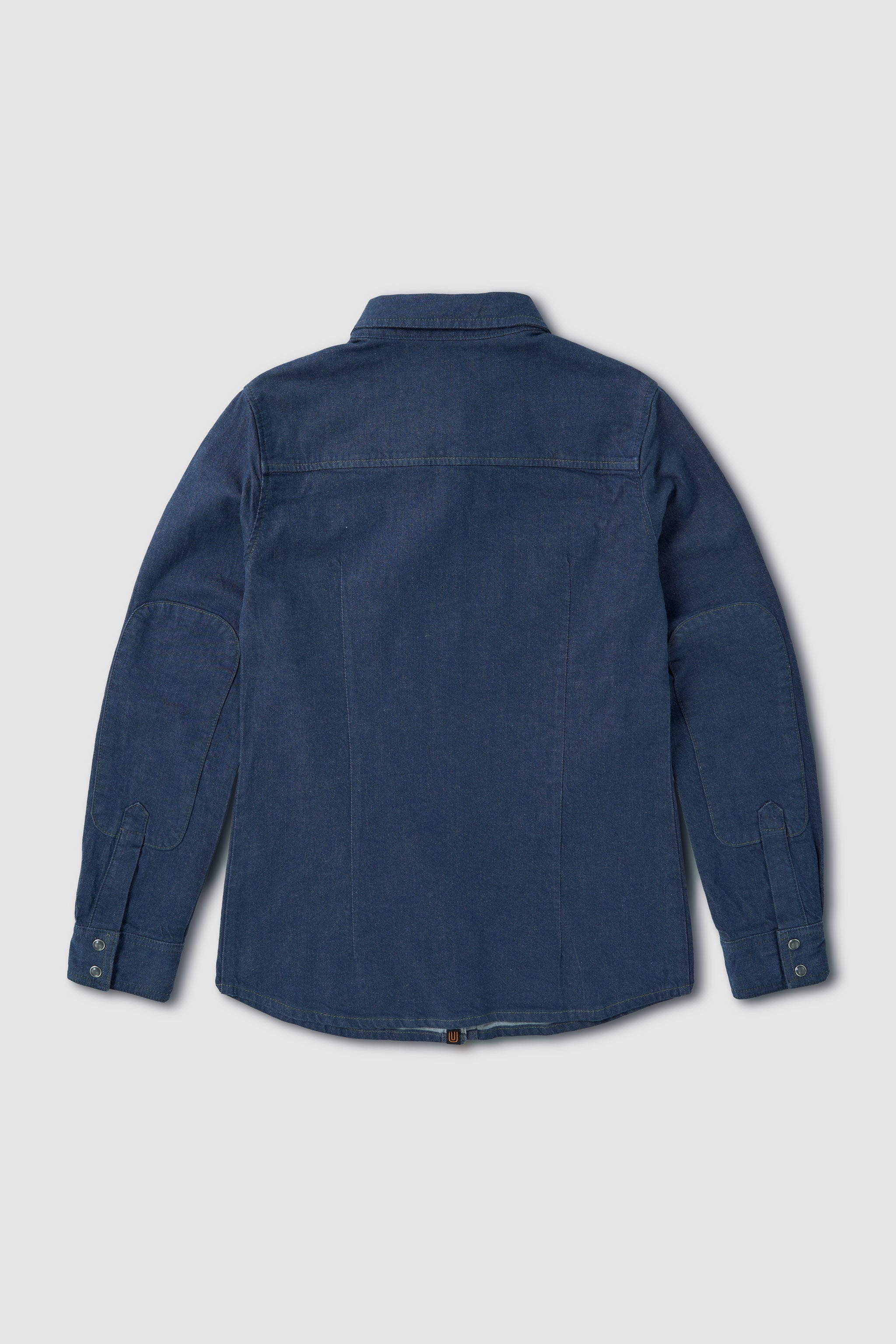 Blue denim shirt on a light gray background